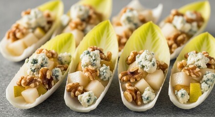 Fresh Endive Boats Appetizer with Pear Blue Cheese and Walnuts.