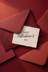 Happy valentine&rsquo;s day card with red envelopes flat lay romantic stationery background
