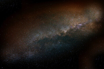 Milky way galaxy streaking across night sky