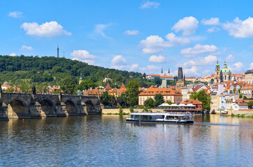 Obraz premium Panoramic view of Petrin Hill, Charles Bridge and Prague Castle in Prague, Czech Republic 