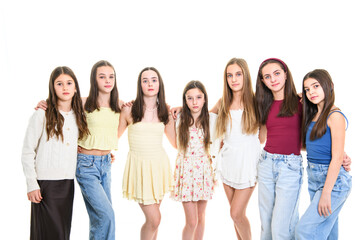 Group Of Teenage Girlfriends on studio white background