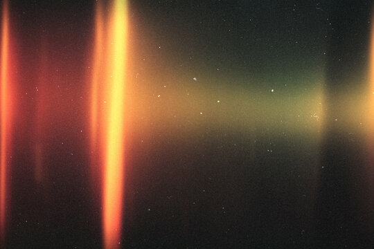 abstract colorful light leaks,grunge film background,retro film overlay effect with scratch dust and ray,retro film distressed grain noise texture flare on black background,old film burn ray lens