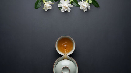 Minimal tea ceremony Qingming festival background with dark copyspace background and floral border. Calm spring design background with space for text