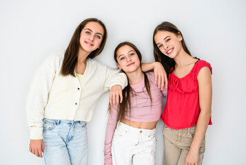 Group Of Teenage Girlfriends on studio white background