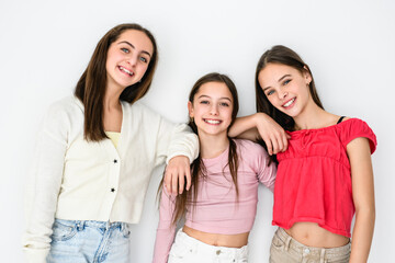 Group Of Teenage Girlfriends on studio white background