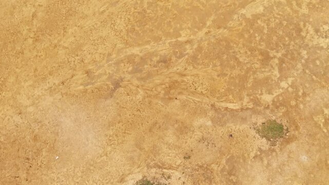 Aerial View of Natural Earth Texture with Golden Brown Surface