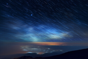 Obraz premium La Palma Caldera Night With Integrated Flux Nebula Revealed By Long-Exposure Stack, Calima-Free Sky, 85mm Telephoto, Subtle Star Trails Near Polaris