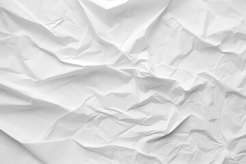 Obraz premium A close-up of crumpled white paper showcasing various textures and folds, creating a dynamic, abstract visual effect.