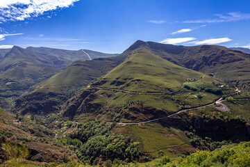 Panoramic mountain landscape of the Courel Mountains with winding roads and green valleys from the...