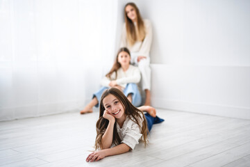 Group Of Teenage Girlfriends on studio white background