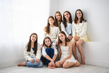 Group Of Teenage Girlfriends on studio white background