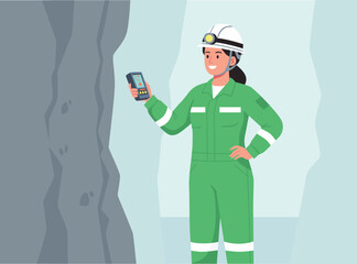 rare earth concept smiling female geologist or miner in a green jumpsuit and hard hat with a headlamp stands near a rock wall, holding a geological surveying device in a mine or tunnel.