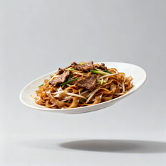 Stir-fried rice noodles with sliced beef and green onions