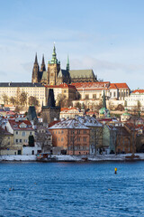 Snowy Prague Lesser Town with gothic Castle, Czech Republic 