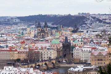 Obraz premium Snowy Prague City from Hill Petrin, Czech Republic 
