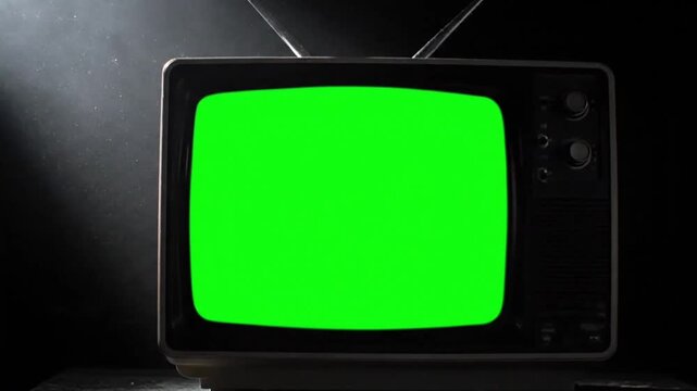 Vintage 3d electronic box design of an old retro tv set with a blank screen media display and vector button icon isolated on a black background object