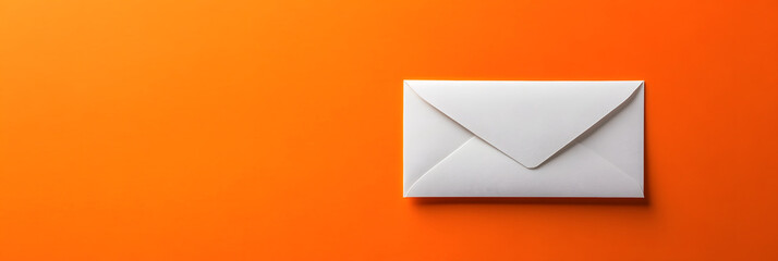 White Envelope on Bold Orange Background
