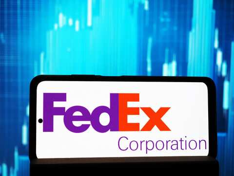 In this photo illustration,  FedEx Corporation logo seen displayed on a smartphone.