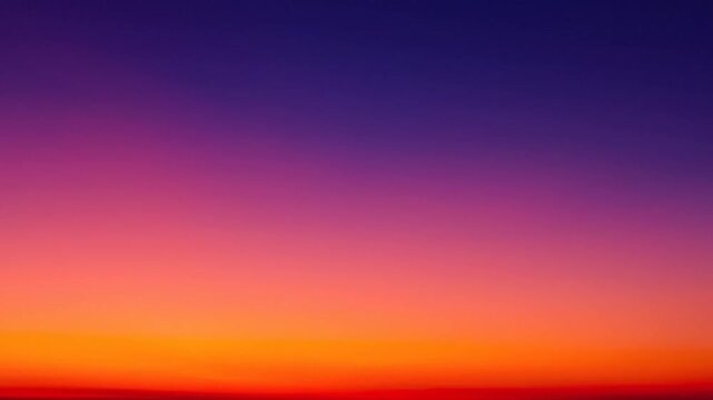 Vibrant sunset gradient with warm orange and pink hues