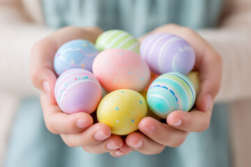 Hands holding pastel painted Easter eggs, soft spring colors and gentle patterns, festive holiday mood, family tradition, seasonal celebration