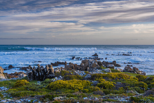 Meeting point of Atlantic and Indian Ocean in Cape Agulhas, South Africa. Garden Route