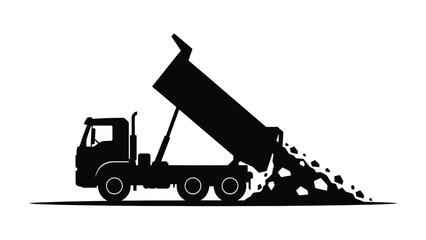 A silhouette of a dump truck unloading a pile of rocks or gravel © Nasima
