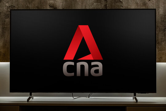 Flat-screen TV set displaying logo of CNA