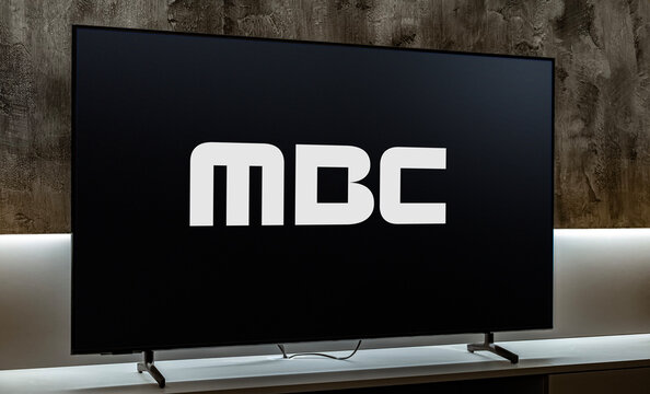 Flat-screen TV set displaying logo of MBC