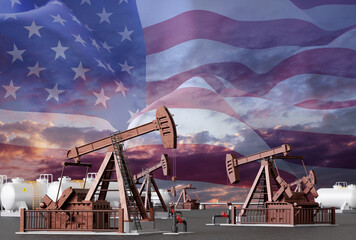 Oil well pumpjacks with USA flag against the sunset. Oil industry of USA concept