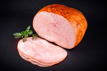 Traditional italian prosciutto arrosto rustico - cooked roasted smoked ham hounch meat cut in this slices