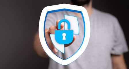 Concept of digital security and data protection. Person showing shield and lock symbol for privacy and safety.
