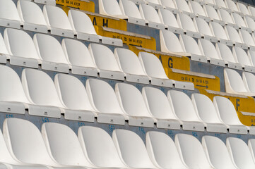 Empty stadium seats awaiting spectators