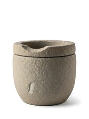 A rustic stone mortar and pestle with a textured finish
