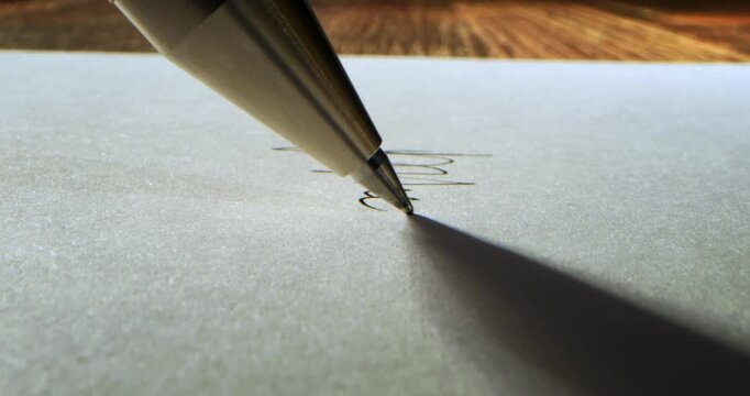 Slow Motion Close Up Of Hand Writing And Carrying A Pen On Paper At 1000 Fps. Concept Of Creativity, Mindfulness, Handwritten Words, Free Expression, Artistic Gesture And Human Connection