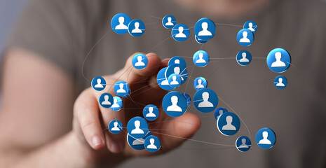 Concept of digital networking and global communication. Person's hand interacting with virtual connections representing people and communication