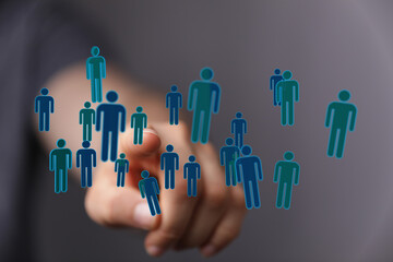 Digital network of connected people, social media concept. Human hand pointing to a group of...