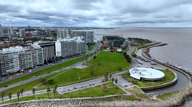 Iconic Montevideo city sign on the Rambla. Panoramic view of the beach and Rio de la Plata coastline in Uruguay.