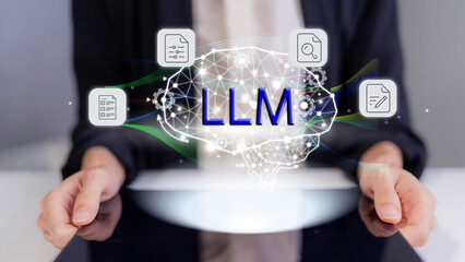 Business professional using tablet with LLM large language model AI for data processing content creation and task automation enhancing business intelligence LLM AI technology