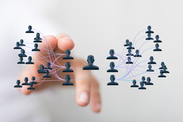 Hand interacting with a network diagram representing connections, communication, teamwork, and business strategy. Symbolizing collaboration, inn