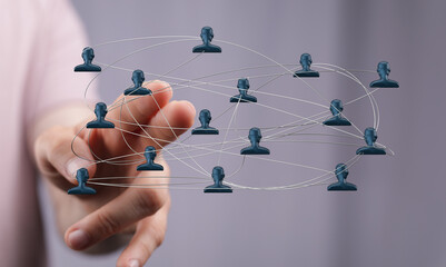 Abstract network of people linked together in a hand. Illustrates concepts such as teamwork, community, connections, and social media networks.