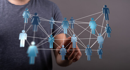 Abstract image showing a network of people connected by lines, representing connection, communication, and social interaction.
