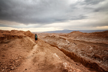 Tourist at the Valle de la Luna, Atacama desert, Chile.