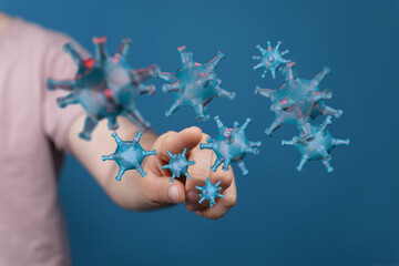 Visual of a hand interacting with digital virus models, highlighting concept of control and influence, symboli