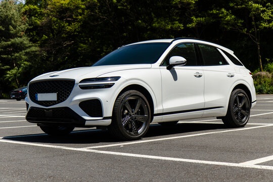 May 9, 2021, Seoul, South Korea - White Genesis GV70 3.5T SUV parked in an outdoor parking lot