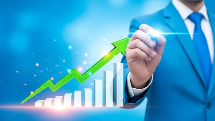 Businessman drawing a green arrow on a graph with a blue background