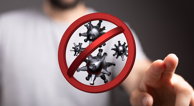 Hand reaching out to the forbidden sign of the virus, concept of health, protection, stop, prevention and pand