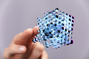 Hand touching digital cubes. Concept of data, technology, cloud, innovation, future. Abstract background for mo