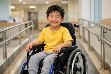 A joyful child in a wheelchair smiles in a hospital setting, highlighting the experiences of disabled children in education