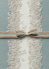 Elegant lace and ribbon adornment on soft blue background for special occasions and celebrations