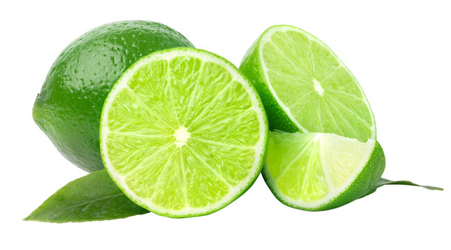 Fresh limes whole and sliced with green leaf